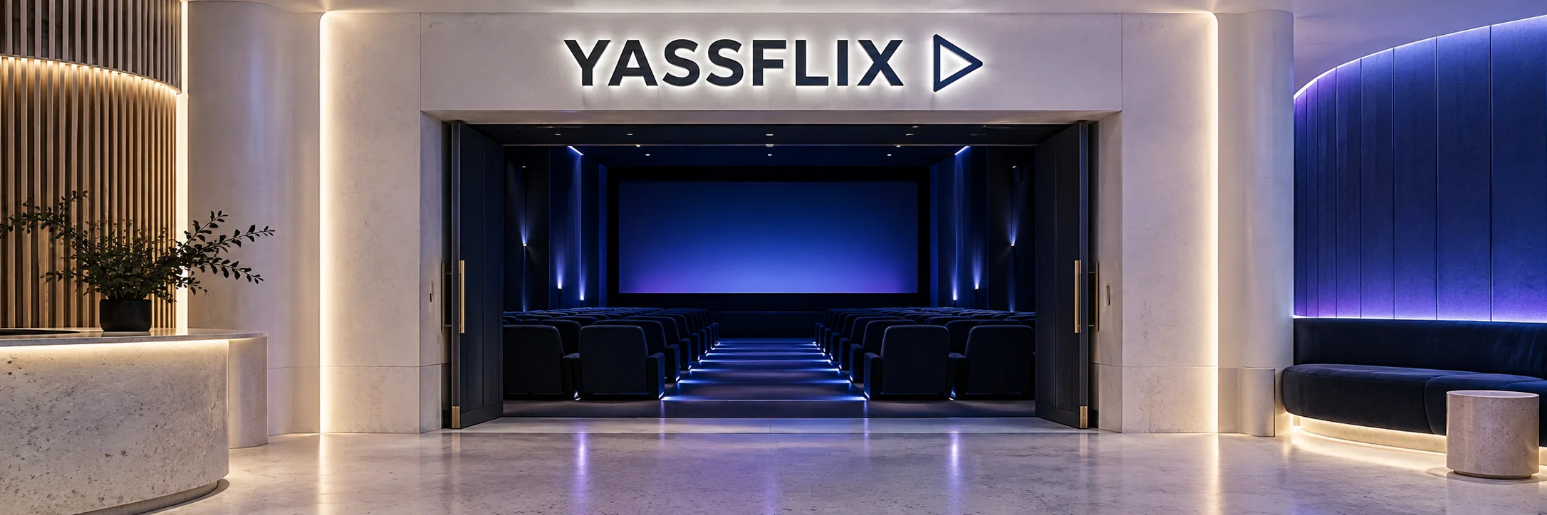YASSFLIX illuminated above a contemporary white cinema entrance with blue and violet lighting